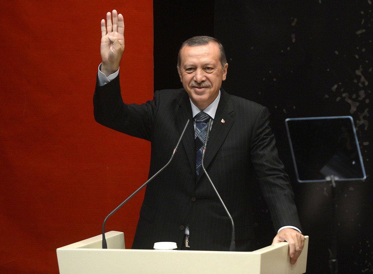 Photo of Erdogan at the podium - Article Image